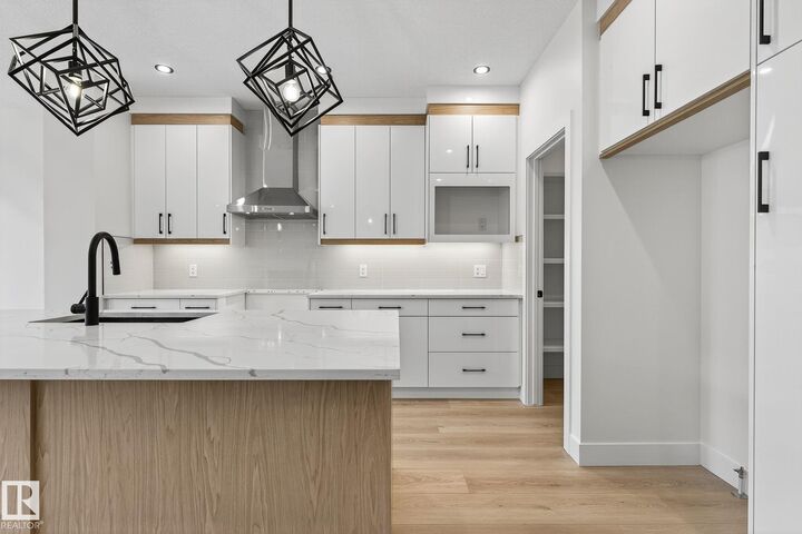Property Photo: 136 Wyatt Ridge AB T8L 3L7