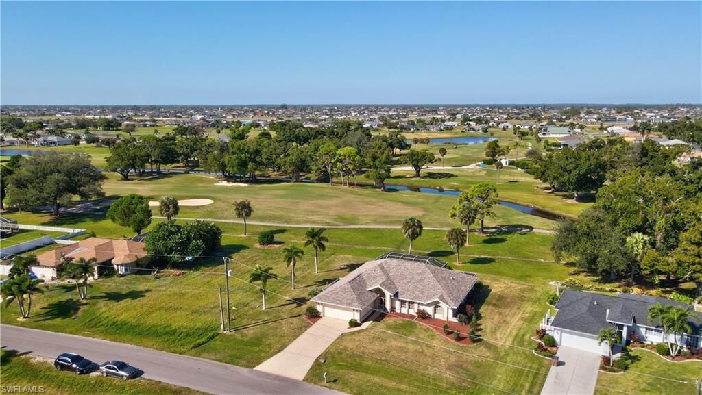 Property Photo: 1574 NW 28th Ave FL 33993