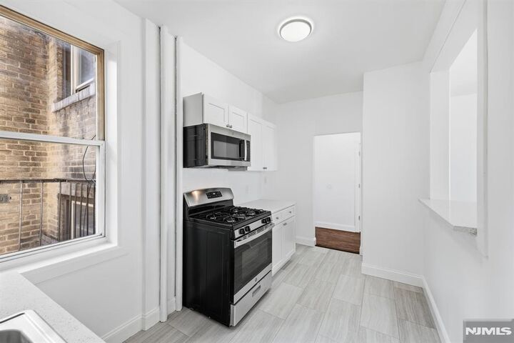 Property Photo:  137 Kensington Avenue 401  NJ 07304 
