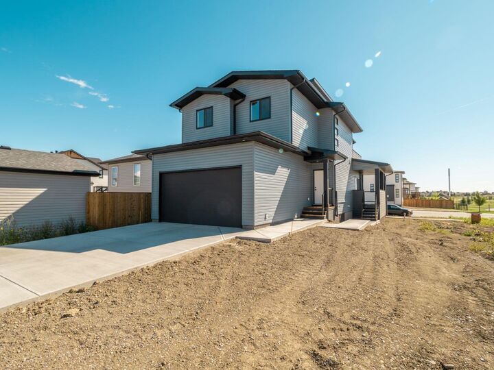 Property Photo: 351 Blackwolf Boulevard N AB T1H 7J5