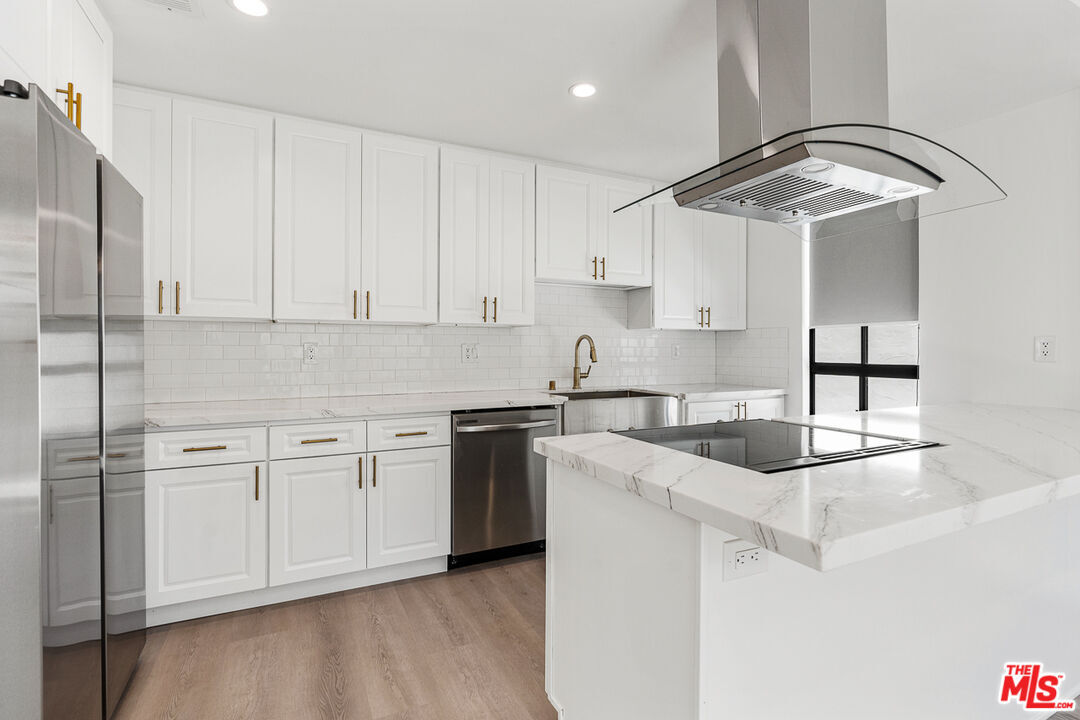 Property Photo:  9191 Charleville Blvd  CA 90212