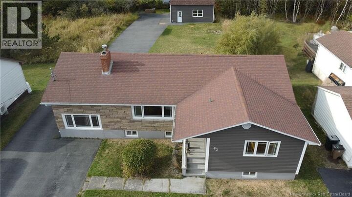 Property Photo: 63 Buena Vista Avenue NB E2M 2S7