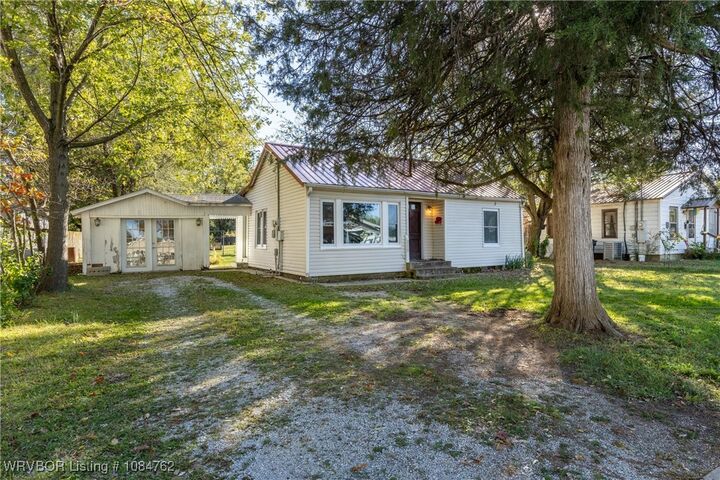 Property Photo:  215 E Velma Avenue  AR 72764