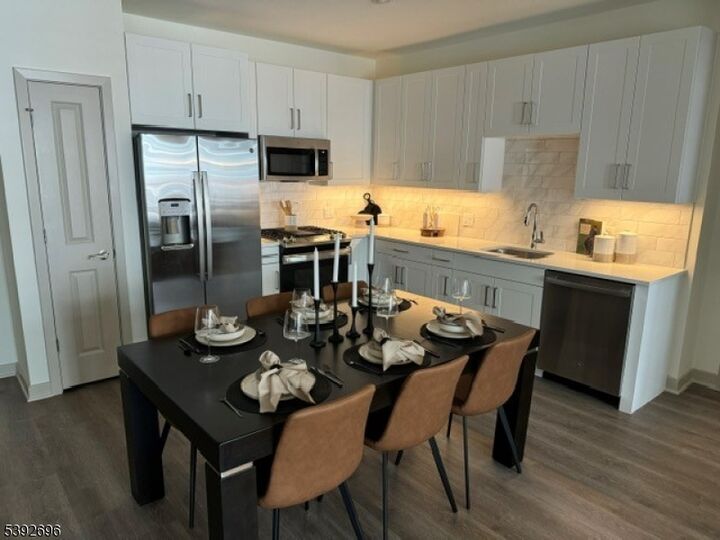 Property Photo:  100 Eisenhower Pkway 358  NJ 07039