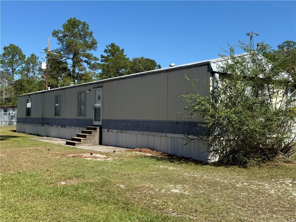 Property Photo:  64096 Mangano Road 136  LA 70452