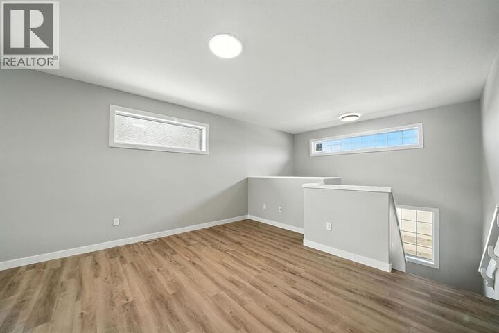 Property Photo:  84 Reynolds Road  AB T4S 0L8