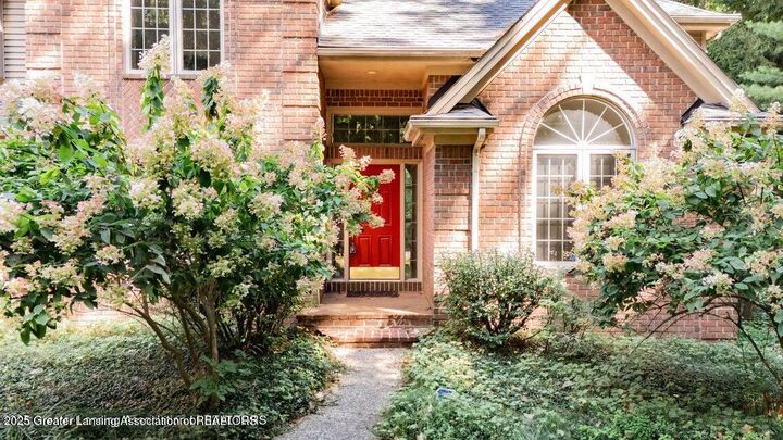 Property Photo:  4710 Wellington Drive  MI 48864 