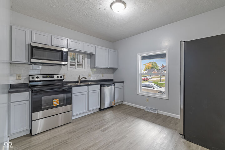 Property Photo:  1610 E Palmer Street  IN 46203 