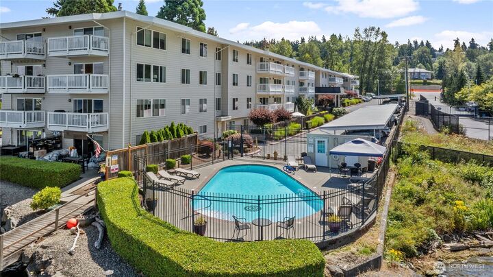 Property Photo:  5021  Ripley Lane N 212  WA 98056