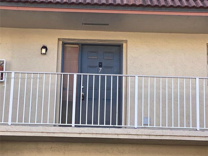 Property Photo:  3750 NW 115th Ave 7-5  FL 33065