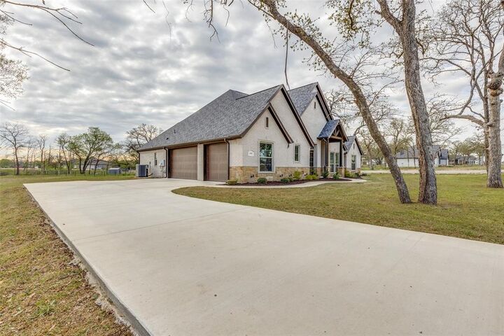 Photo de la propriété:  105 Clayton Crossing  TX 76082