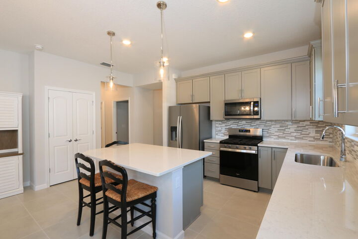 Property Photo: 13892 SW Gingerline Drive FL 34987