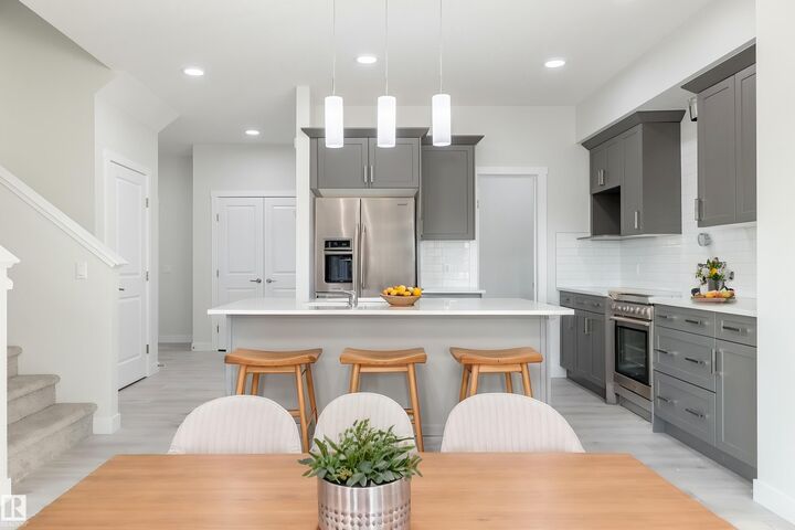 Property Photo:  403 157 Avenue NE  AB T5Y 6K8