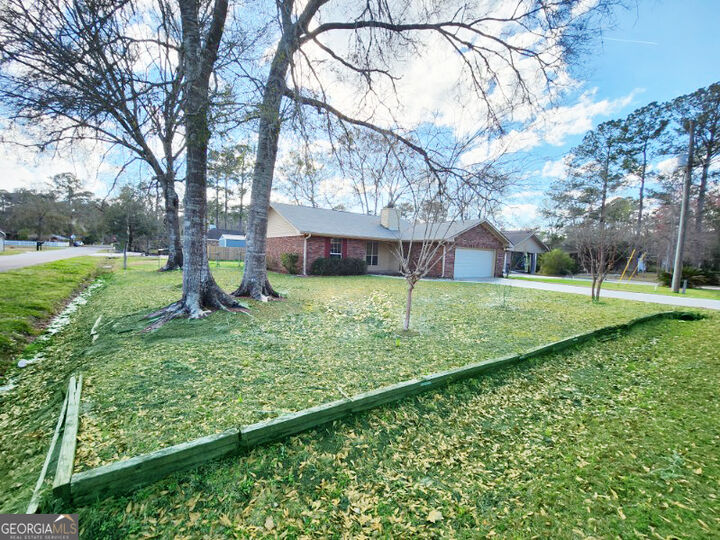 Property Photo:  157 W Peach Avenue  GA 31548 