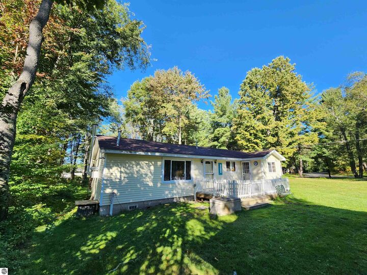 Property Photo:  5611 NE East Shore Drive  MI 49646 