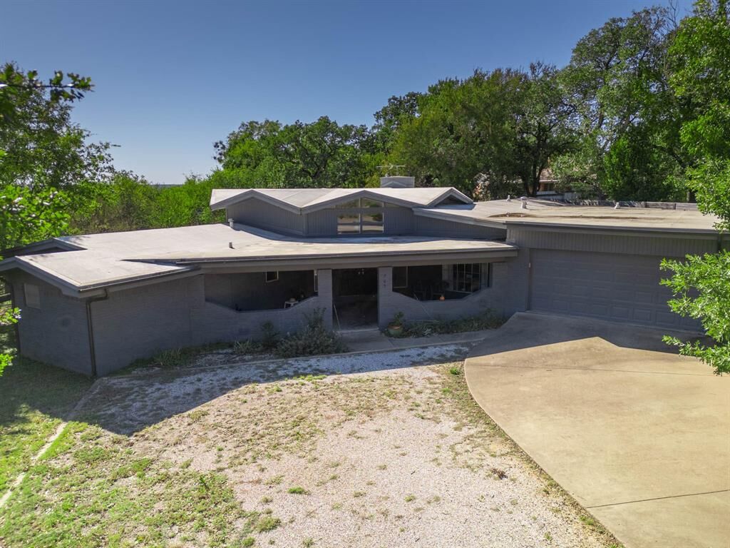 Property Photo:  705 NW 10th Street  TX 76067 