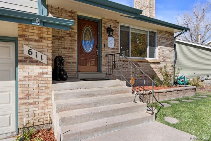 Property Photo:  611 S Laredo Circle  CO 80017 