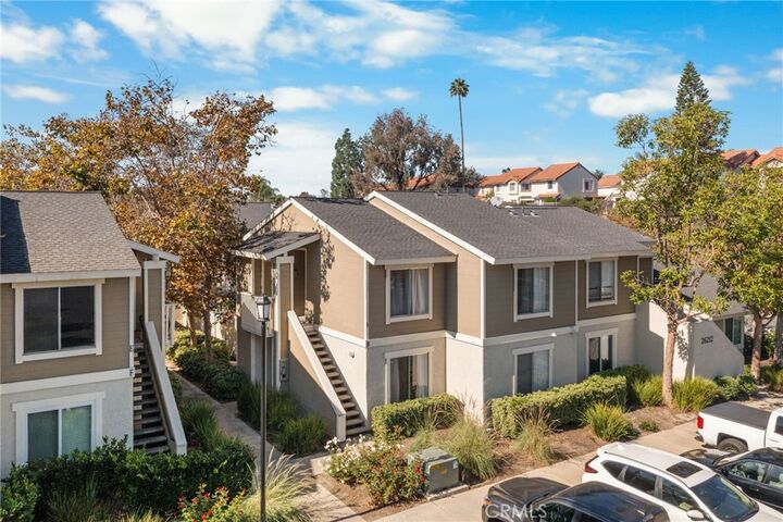 Property Photo: 26212 Los Viveros 215 CA 92691