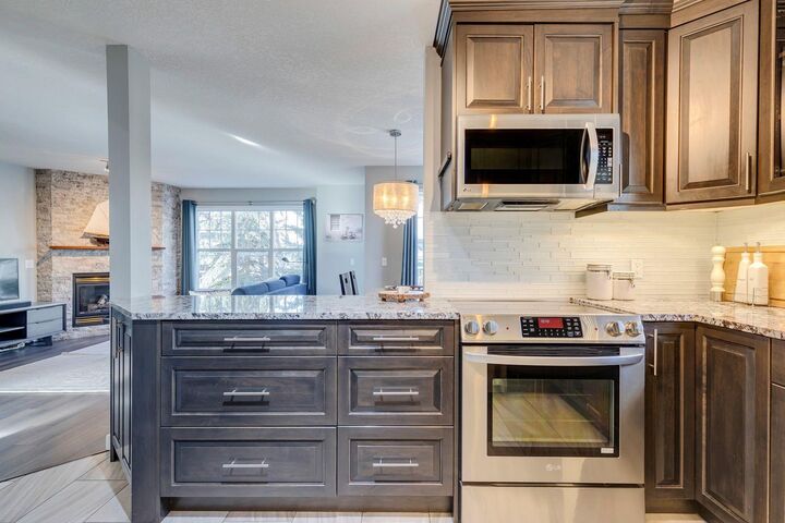 Property Photo:  7171 Coach Hill Road SW 3101  AB T3H 3R7 