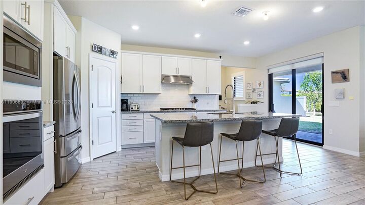 Property Photo:  8605 Patron Ln  FL 33467 