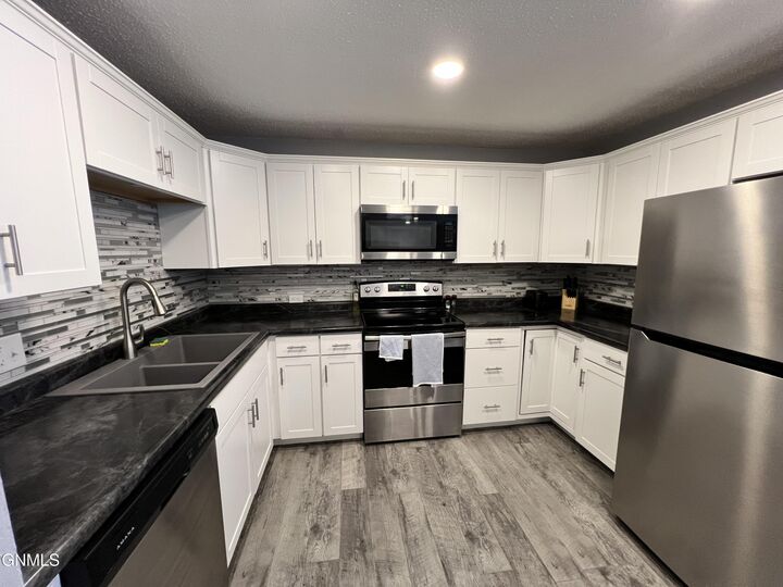 Property Photo:  701 Interstate Avenue E 1  ND 58503 