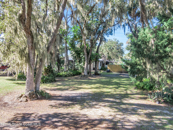 Property Photo:  865 Pine Island Road  FL 32953 