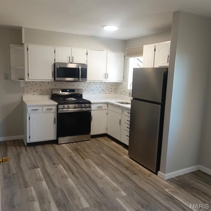 Property Photo:  8827 Sumter Drive  MO 63136 