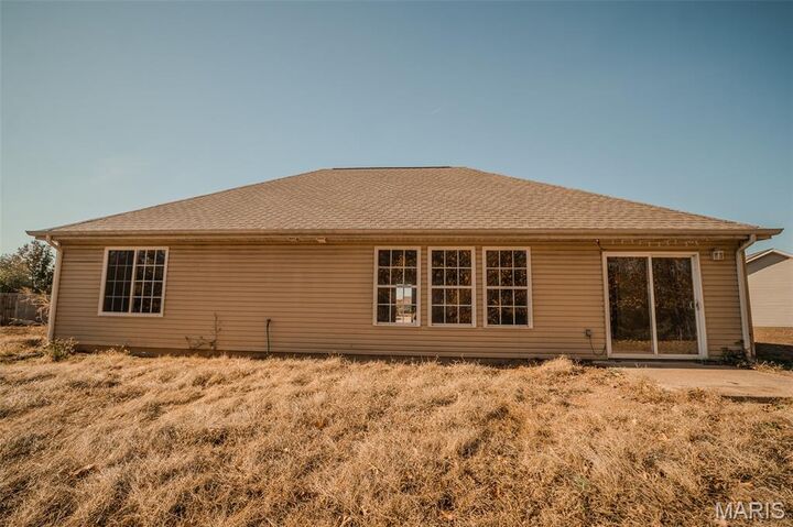 Property Photo:  202 Casimir Court  MO 65583 