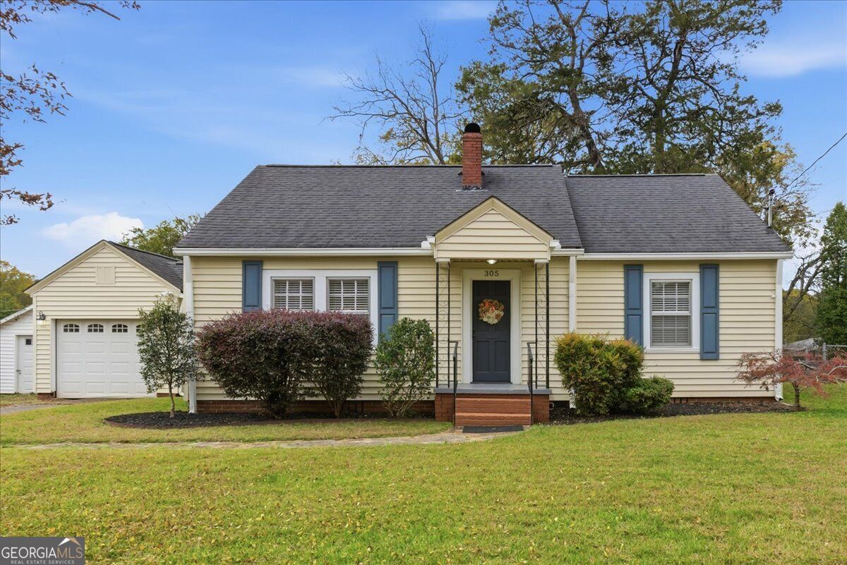Property Photo:  305 N Cave Spring Street  GA 30125 