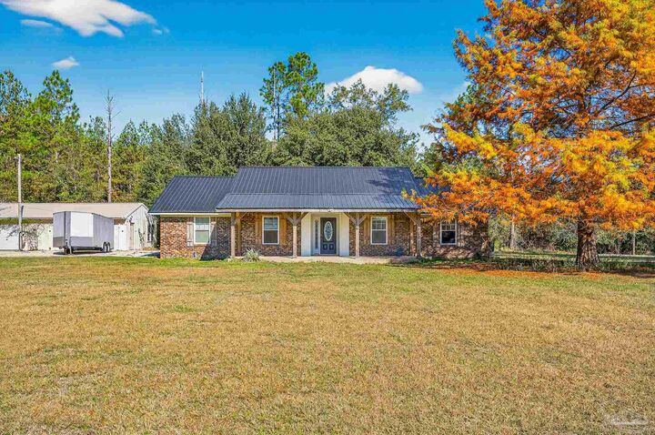 Property Photo:  10210 S Pineville Rd  FL 32568 