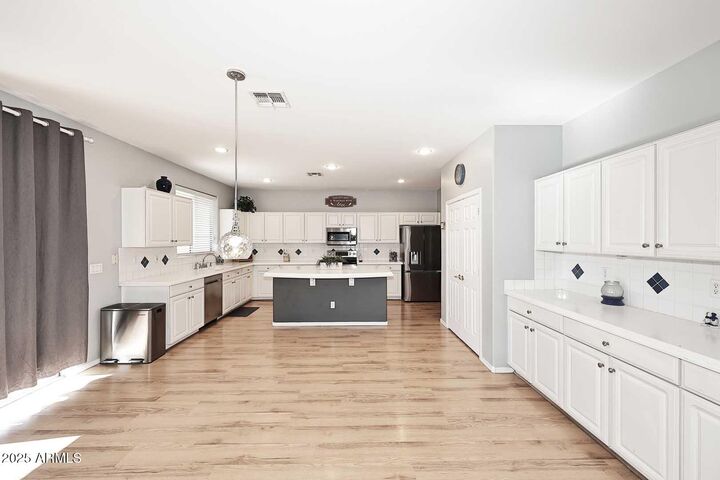 Property Photo: 13563 W Boca Raton Road AZ 85379