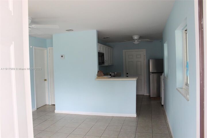 Property Photo: 5050 SE Ebbtide Ave FL 34997