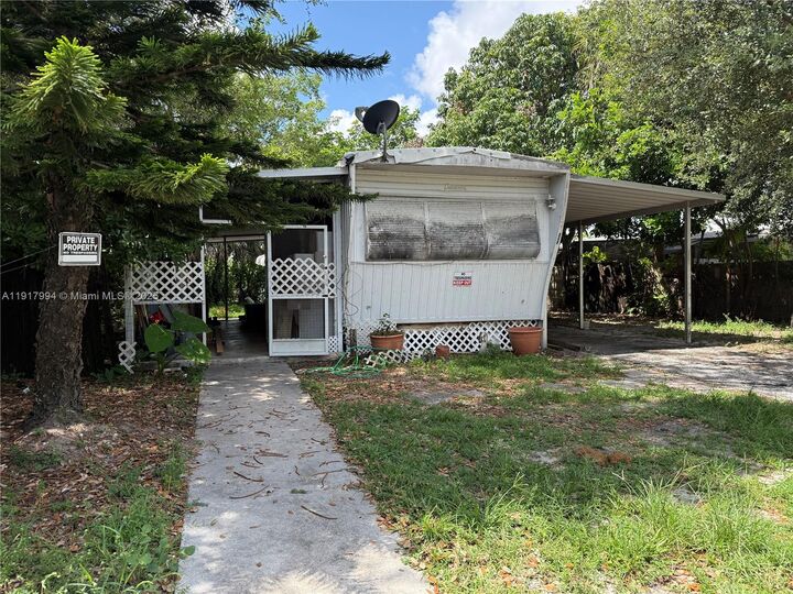 Property Photo:  5964 Tiffany Pl  FL 33417 