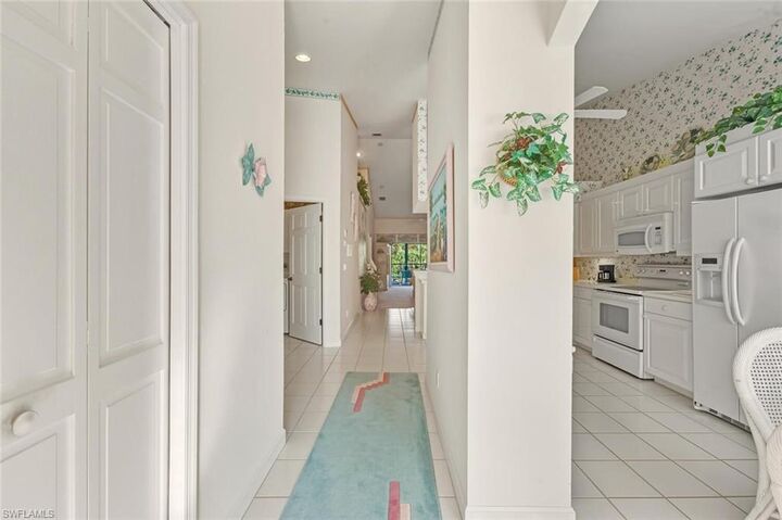 Property Photo:  1940 Cascades Dr 5504  FL 34112 