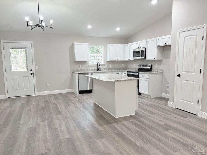 Property Photo: 7234 Par Ln FL 32570