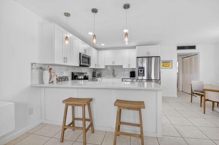 Property Photo:  154 Valencia G  FL 33446 