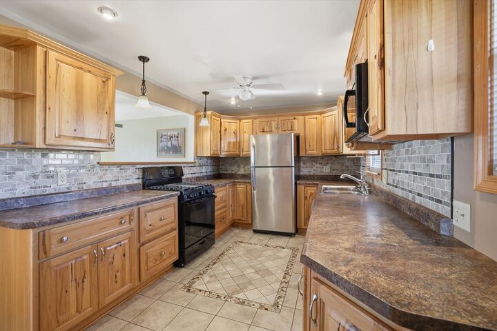 Property Photo: 9320 W Howard Ave WI 53228