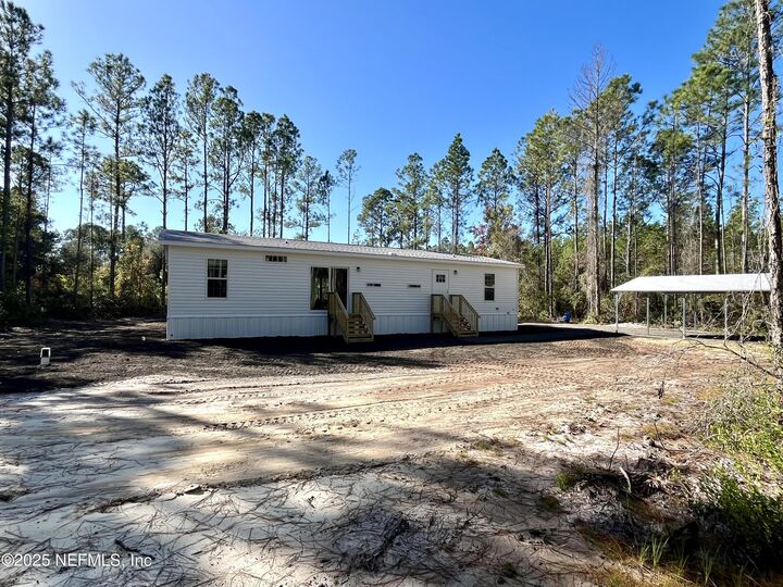 Property Photo:  100 E Escambia Street  FL 32177 