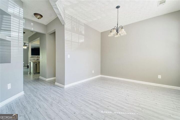 Property Photo: 1207 Penhurst Way GA 30043