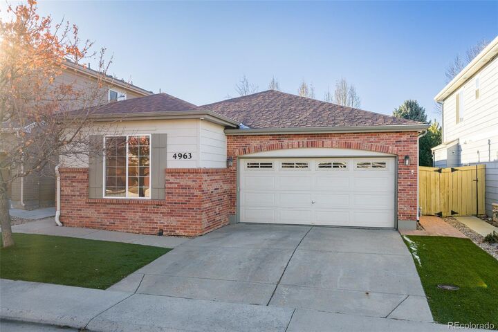 Property Photo: 4963 S Zephyr Street CO 80123