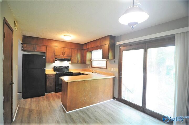 Property Photo: 9002 Mahogany Row SE AL 35802