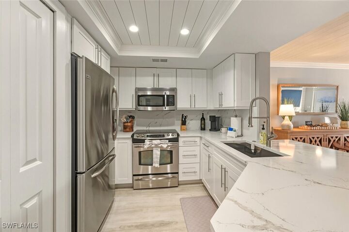 Property Photo: 9103 Vanderbilt Drive 2 FL 34108