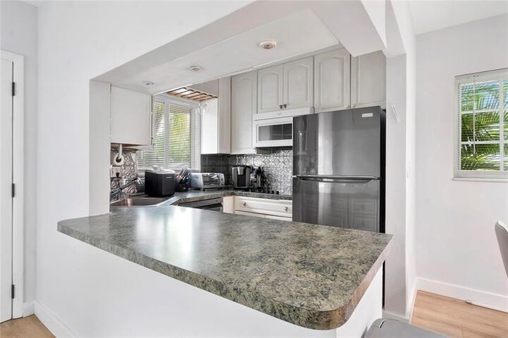 Property Photo: 3030 NE 5th Ter 1 FL 33334