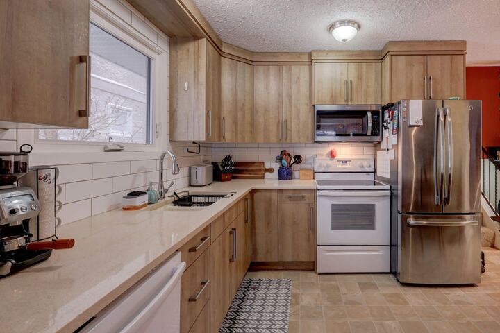 Property Photo: 136 Templeby Place NE AB T1Y 5G9