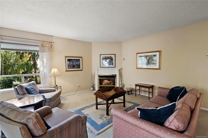 Property Photo:  9919 Fourth St 206  BC V8L 2Z6 