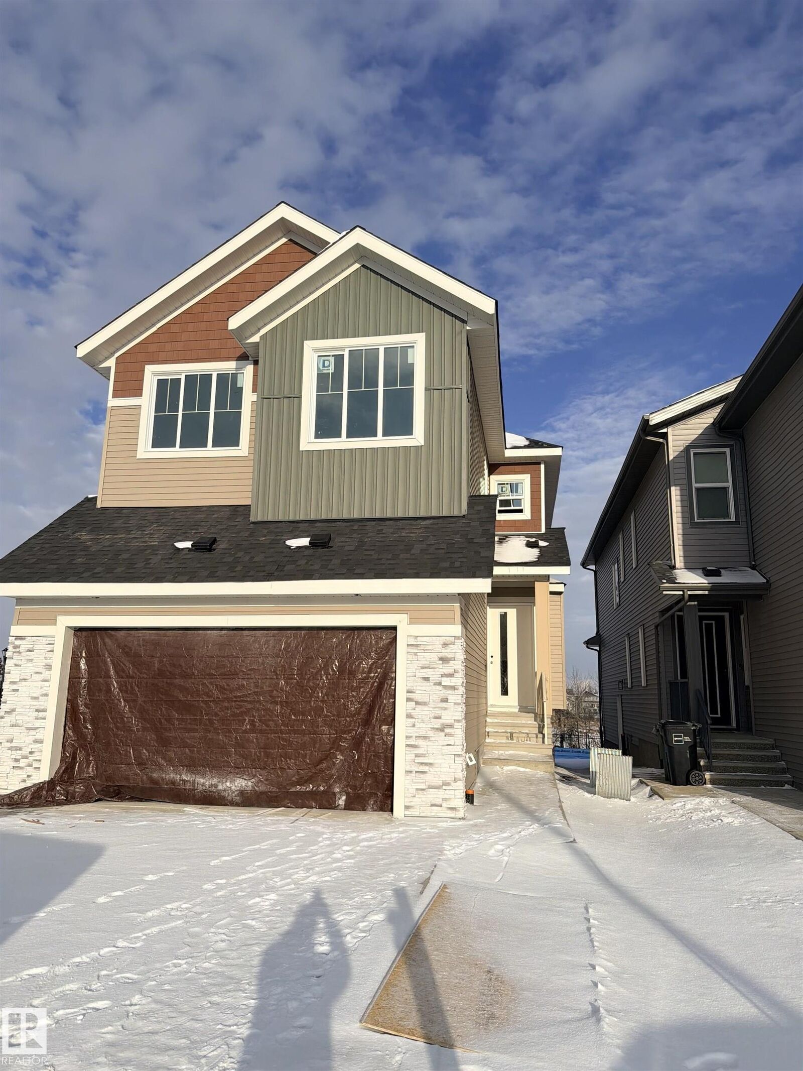 Property Photo:  2020 Collip Crescent SW  AB T6W 4W9 