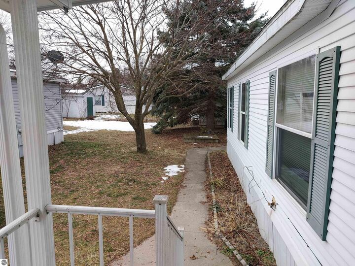 Property Photo:  2377 Friendship Drive  MI 49686 