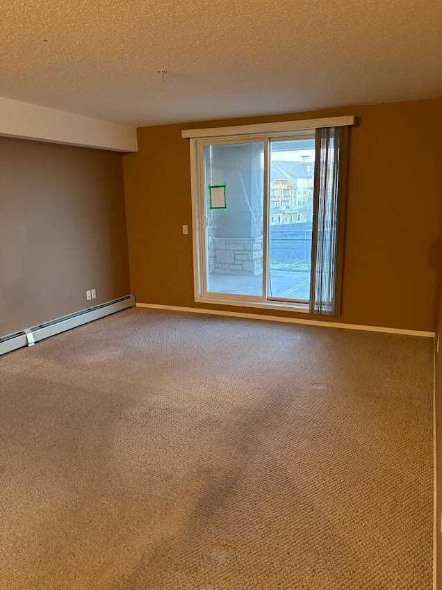 Property Photo:  2518 Fish Creek Boulevard SW 2112  AB T2Y 4T6 