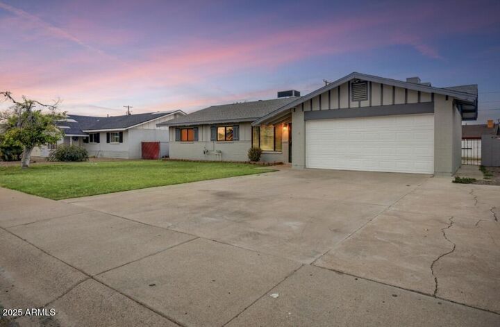 Property Photo:  124 E Cairo Drive  AZ 85282 