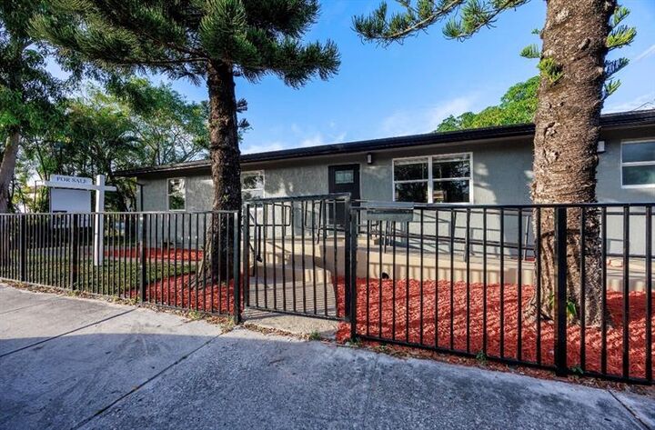 Property Photo:  800 NW 6th Ave  FL 33060 